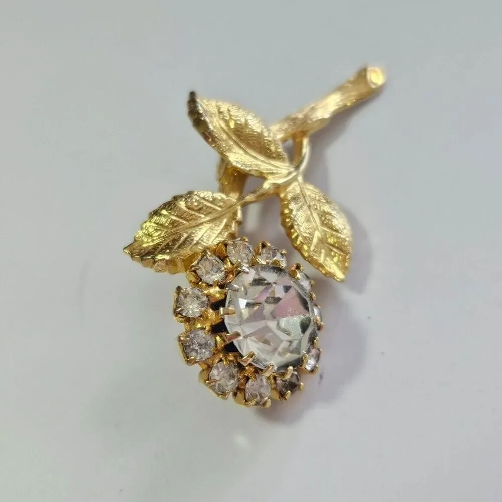 Vintage gold tone rhinestone flower brooch